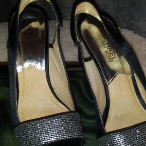 Black sling back pumps